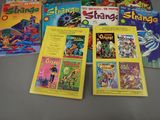 a lot of comic books that are on the table
