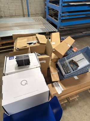 boxes and boxes of electronic equipment in a warehouse