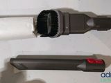 two different types of hair dryers sitting on a table