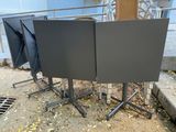 three tv screens sitting on the ground next to each other