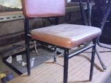 a chair that is sitting on a table in a room