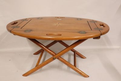 an image of a wooden folding table with four legs