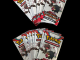 four packs of pokemon trading cards are shown on a black background