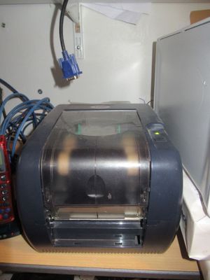 an image of a printer sitting on top of a desk