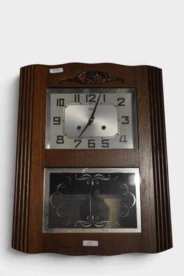 a clock that is hanging on the wall