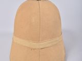 beige hat on white background with a brown band around the brim of the hat
