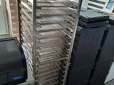 an image of a commercial food drying rack in a kitchen