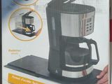 packaging of a coffee maker on display in a store
