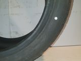 a close up of a tire with a hole in the middle of it