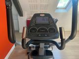 a close up of a stationary exercise bike in a room