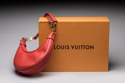 louis vuitton handbag in red leather with gold hardware