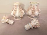 three vases that are sitting on a table