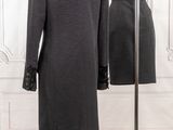 an image of a mannequin with a coat on it