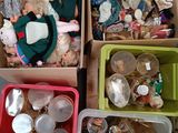 three boxes with different types of dolls in them