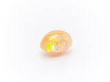 a yellow oplite stone on a white background