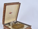 a small wooden box with a record player inside of it