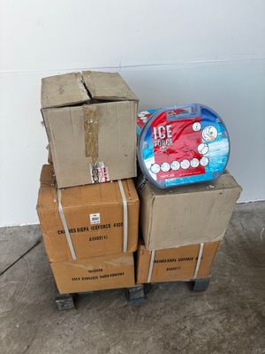many boxes stacked on top of each other on the floor