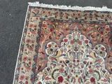 a rug that is laying on the ground on the ground
