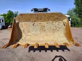 a large bulldozer that is sitting in the dirt