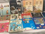a lot of books that are on a table
