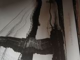 a black and white photo of a bridge in a picture frame