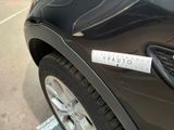 a close up of a car with a sticker on the side of it