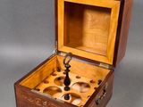 an image of a wooden box with a chess set inside of it