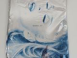 a plastic bag with a picture of a woman on it