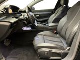 the interior of a car with a black leather seat and a black steering wheel