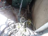 a fire hydrant that is sitting next to a pile of wires