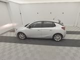 a picture of a white car parked in a garage