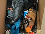 a cardboard box filled with assorted items in it