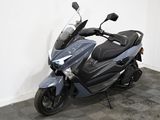 a motorcycle that is parked in a room