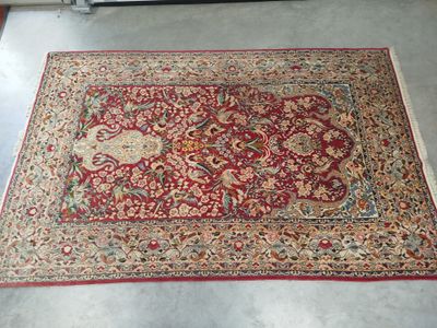 an oriental rug on the floor in a room