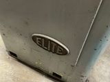 a metal box with a sticker on it sitting on the floor