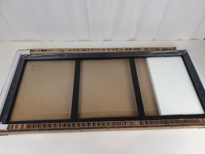 a close up of a picture of a window in a cardboard box