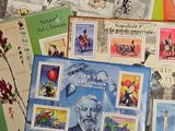 many different types of stamps on a table