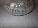 a clear glass ball with a label on it