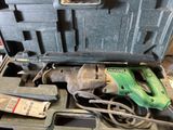 a tool box with tools in it sitting on a table