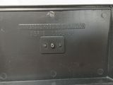 a close up of a metal box on a white surface