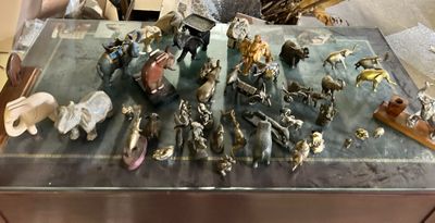 many figurines that are sitting on a table