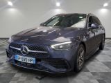 the mercedes cla is parked on a checkered floor in a garage