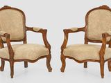 paire de fauteuils en noyer sculpté de style Louis XV