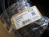 a black hose wrapped in plastic with a price tag on it