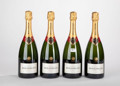 trois bouteilles de champagne sont alignées sur un fond blanc