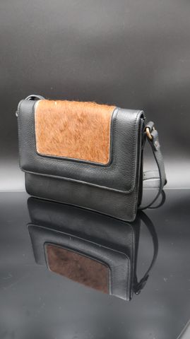 CHEVIGNON : sac porté main en cuir