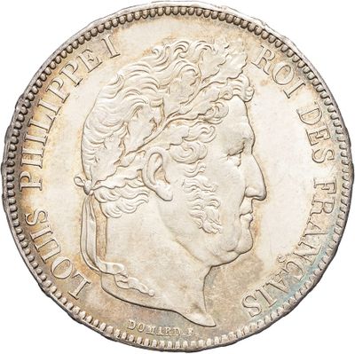 a close up of a coin on a white background