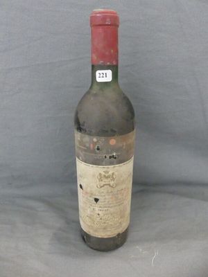 a bottle of wine that is sitting on a table