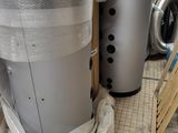 a trash can sitting on the floor next to a trash can