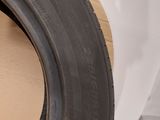 a close up of a tire on a cardboard box on a table